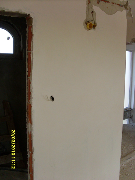 Main bedroom showing bathroom and corridor